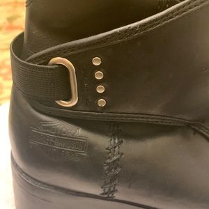 Harley Davidson black boots.  Size 8.5, 1 in heel, cross stitching on both side.